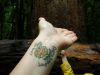 sunflower tat on wrist